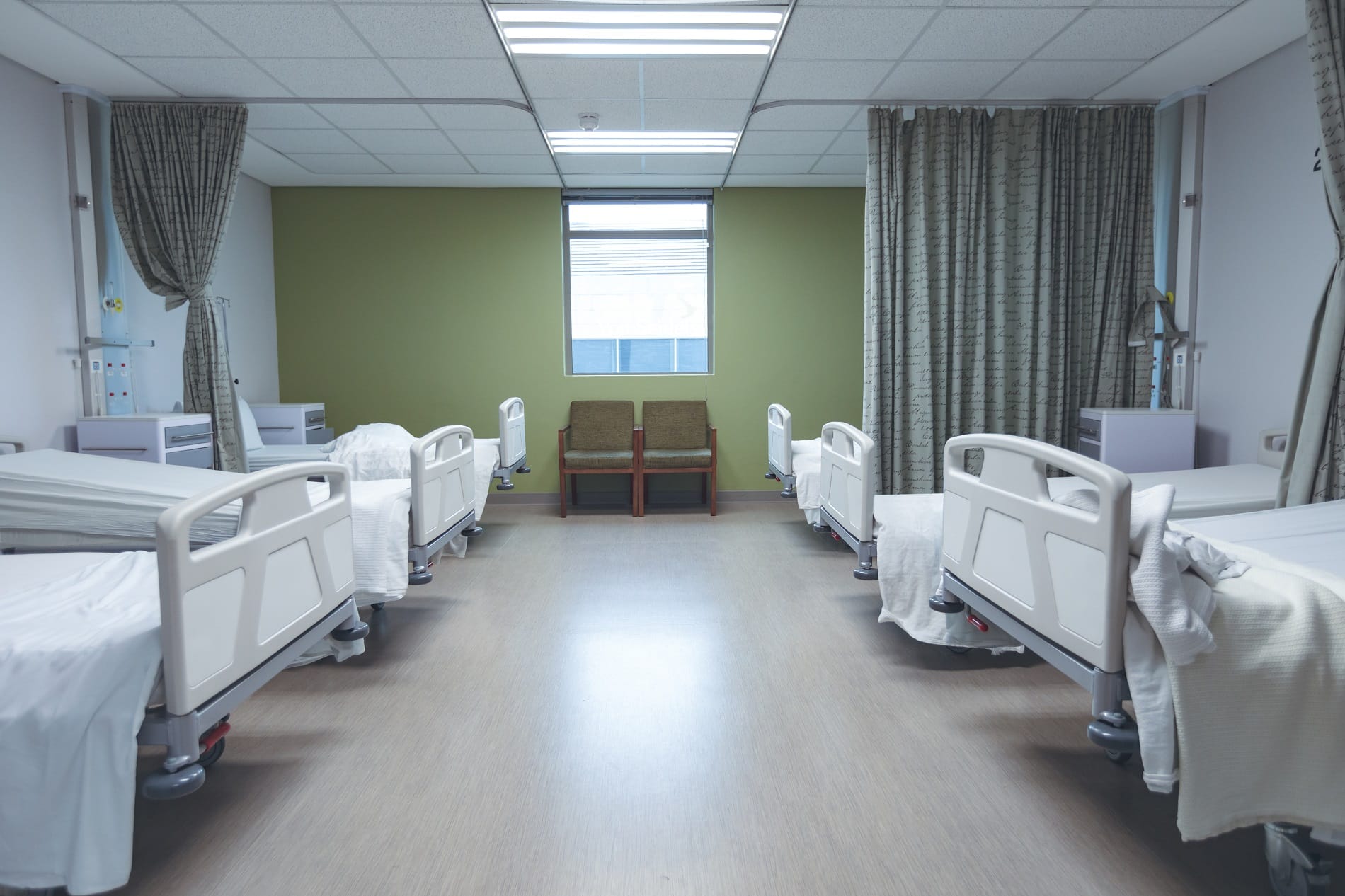 Front view of empty ward in modern hospital